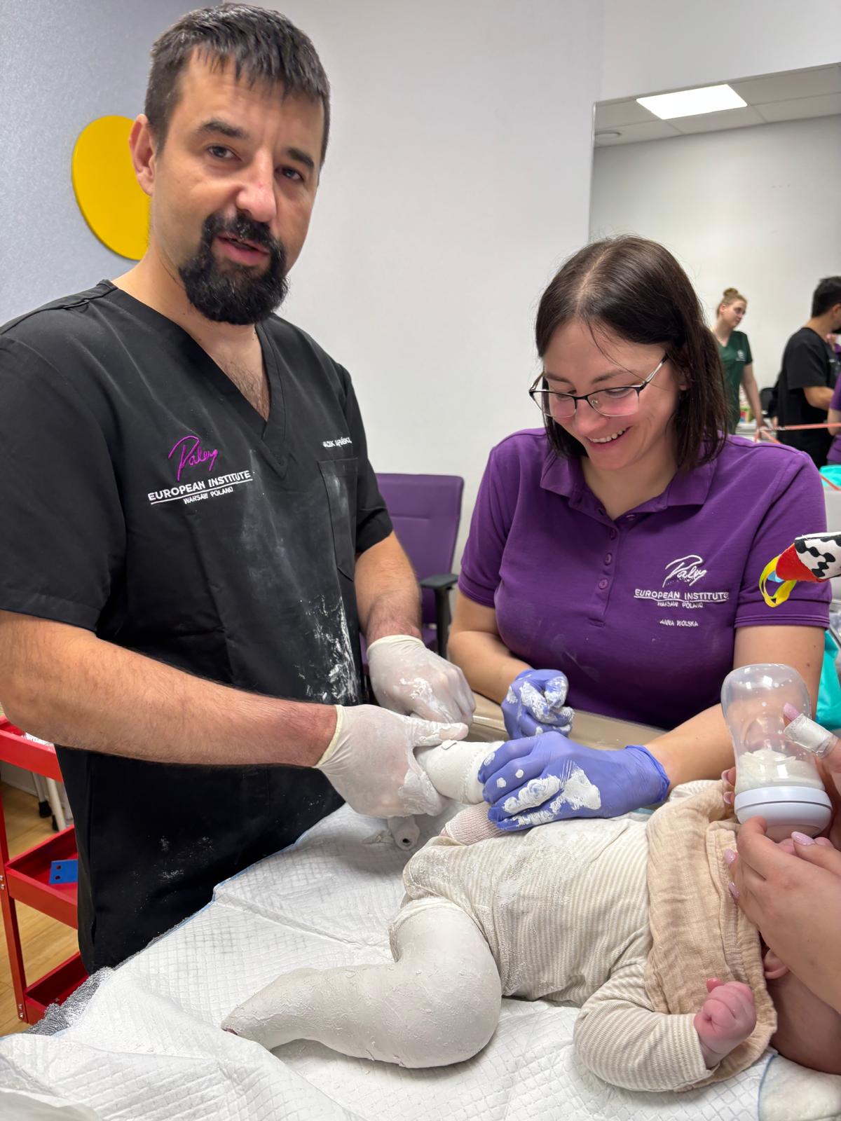 Casting session with the Paley clinical team — parents stay close to comfort the baby